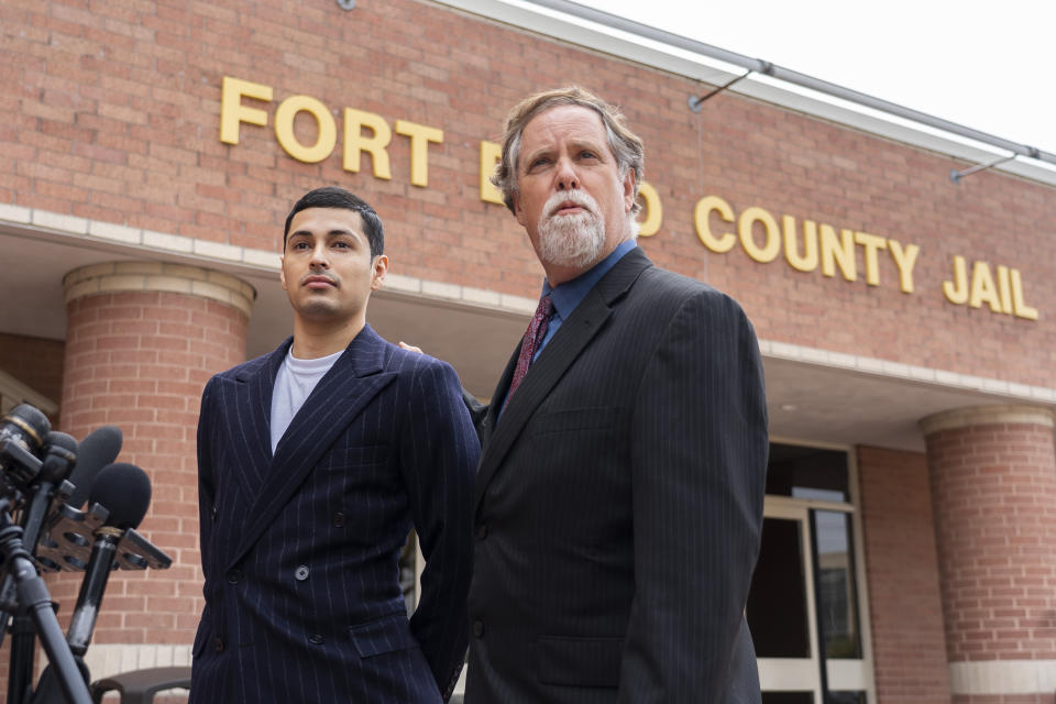 Victor Cuevas appears with his lawyer Michael Elliott after bonding out of jail, Wednesday, May 12, 2021, at the Fort Bend County Jail in Richmond, Texas. Cuevas was arrested Monday after fleeing a Houston Police Officer with a missing tiger in west Houston. Police said Monday that the tiger’s whereabouts are not known. (Mark Mulligan/Houston Chronicle via AP)