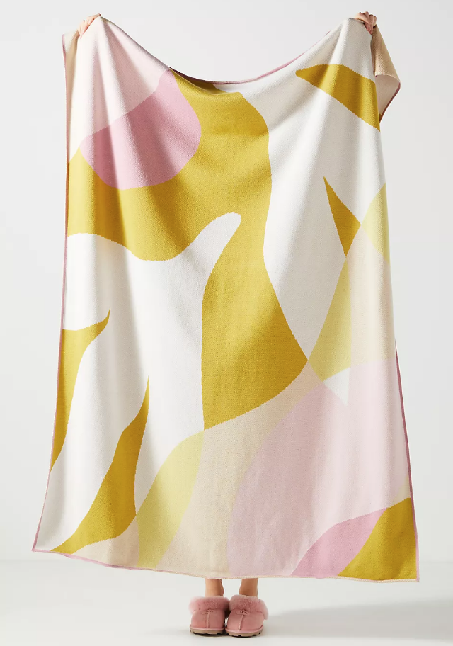<p><strong>Anthropologie</strong></p><p>anthropologie.com</p><p><strong>$62.40</strong></p><p>Upgrade their bedding with this chic throw blanket. Not only is it a stylish addition to their bed, it's also great for movie nights or late study sessions. This one from Anthropologie features bright florals and is machine washable for easy care.</p>