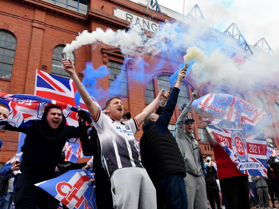 Rangers fans celebrate outside the club’s Ibrox Stadium (Getty Images)