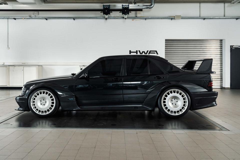 a black car parked in a garage