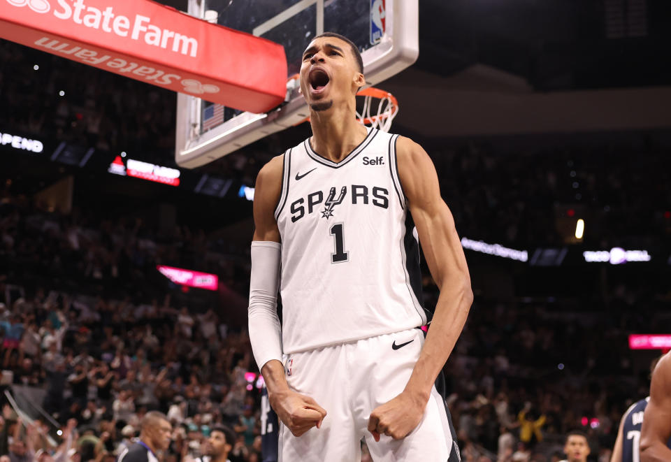 SAN ANTONIO, TEXAS - OCTOBER 25: Victor Wembanyama #1 of the San Antonio Spurs reacts after a dunk during the fourth quarter against the Dallas Mavericks at Frost Bank Center on October 25, 2023 in San Antonio, Texas. NOTE TO USER: User expressly acknowledges and agrees that, by downloading and/or using this Photograph, user is consenting to the terms and conditions of the Getty Images License Agreement. (Photo by Christian Petersen/Getty Images)