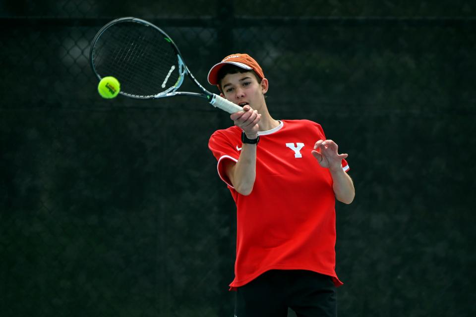 Yankton's Harrison Krajewski returns a shot against Pierre's Luke Leingang during the No. 4 singles championship on day two of the Class A state tournament on Tuesday at Sioux Park.