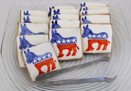 Cookies decorated with the Democratic party logo is seen at the site of the PBS NewsHour U.S. Democratic presidential candidates debate in Milwaukee, Wisconsin, United States, February 11, 2016. REUTERS/Jim Young