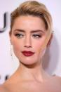 <p>Amber Heard's silver eyeshadow and berry red lipstick are the perfect inspiration for party make-up. The combination will give your complexion a radiant glow, so try applying Charlotte Tilbury's <a rel="nofollow noopener" href="https://www.charlottetilbury.com/uk/luxury-palette-of-pops-starlight.html" target="_blank" data-ylk="slk:Luxury Palette of Pops in Silverlight;elm:context_link;itc:0;sec:content-canvas" class="link ">Luxury Palette of Pops in Silverlight</a>, across your eyelids, brow bones and lower lash line. Then, define your lips with Bobbi Brown's <a rel="nofollow noopener" href="https://www.bobbibrown.co.uk/product/15825/7524/holiday/bestsellers/lip-color?gclid=CjwKCAiAiarfBRASEiwAw1tYvy5LX0_xyCaZ-JJoh-43IY5opSFHag376QaDbSYU4MM848KYDfyMeRoCKi0QAvD_BwE&gclsrc=aw.ds#/shade/Burnt_Red" target="_blank" data-ylk="slk:Lip Color in Burnt Red;elm:context_link;itc:0;sec:content-canvas" class="link ">Lip Color in Burnt Red</a>. A touch of Becca's <a rel="nofollow noopener" href="https://www.spacenk.com/uk/en_GB/makeup/cheeks/highlighter/shimmering-skin-perfector-liquid-highlighter-UK200010468.html?&cm_mmc=PPC%7cGoogle%7cUK-_-Shopping-_-Becca-_-Becca&gclid=CjwKCAiAiarfBRASEiwAw1tYv7oHP_LdcVws2d3OzbRdf7auIK9S7DXrVbU2ywnPGLEeal4tWAwe9hoCGUoQAvD_BwE&gclsrc=aw.ds" target="_blank" data-ylk="slk:Skin Perfector;elm:context_link;itc:0;sec:content-canvas" class="link ">Skin Perfector</a> will help too. </p>