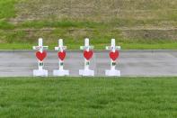 <p>Memorial Crosses are Erected by Greg Zanis with Crosses for Losses as Community members create makeshift memorials for and stop by to pay respects to the victims of the Waffle House shooting on April 24, 2018 in Antioch, Tenn. (Photo: Jason Davis/Getty Images) </p>