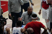 Philadelphia 76ers head coach Doc Rivers, center, talks to his players during a break in play in the first half of Game 3 of a second-round NBA basketball playoff series against the Atlanta Hawks, Friday, June 11, 2021, in Atlanta. (AP Photo/John Bazemore)