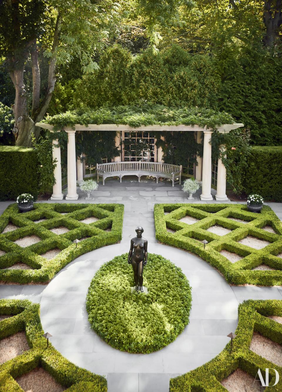 The parterre garden and arbor at a Hamptons retreat.