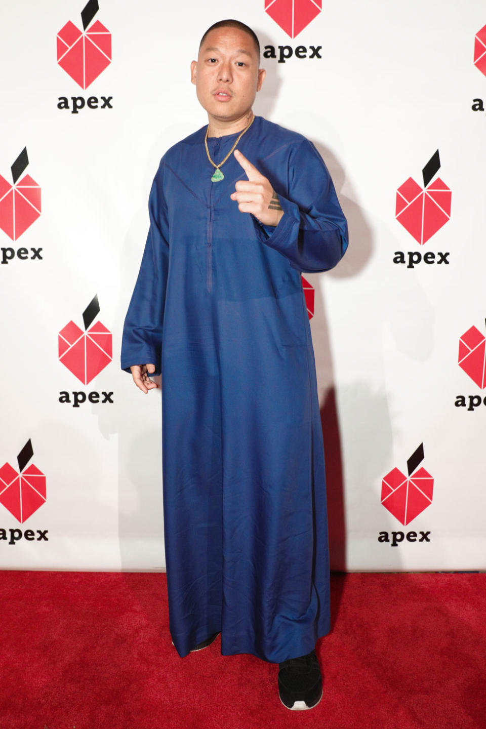 <p>Chef, restaurateur, and creator of <em>Fresh Off the Boat</em>, attends the gala in a long-sleeved blue smock. (Photo: BFA/Courtesy of Apex for Youth) </p>