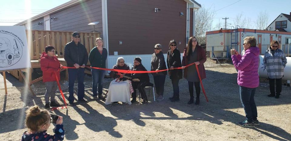 A ribbon is cut during a grand opening event for a new daycare in Fort Providence, N.W.T. on Wednesday.