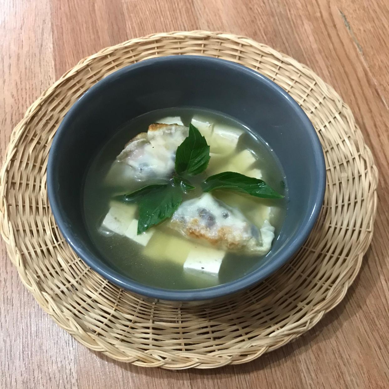 Floating dumplings in a simple soup ... it's a delicious summer meal.
