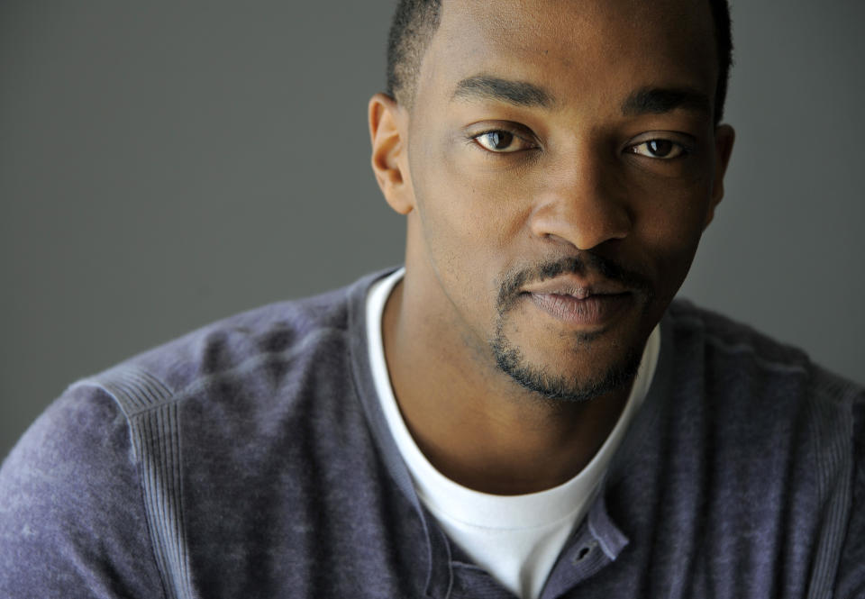 In this Wednesday, March 12, 2014 photo, Anthony Mackie, a cast member in "Captain America: The Winter Soldier," poses for a portrait in Beverly Hills, Calif. Mackie plays the role of Falcon in the Marvel/Disney movie which releases on Friday, April 4, 2014. Being the character of Falcon was "monumental" to the actor. (Photo by Chris Pizzello/Invision/AP)