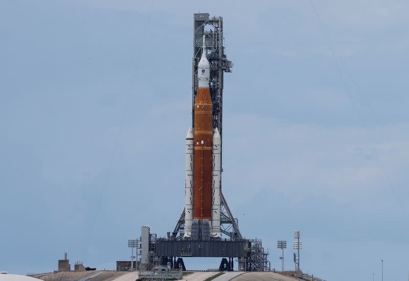 NASA's next-generation moon rocket, the Space Launch System (SLS) rocket with its Orion crew capsule perched on top, stands on launch pad 39B at Cape Canaveral,