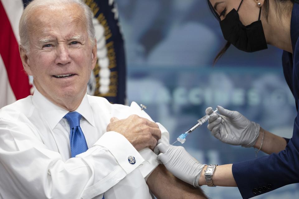 President Biden receiving his third COVID-19 booster