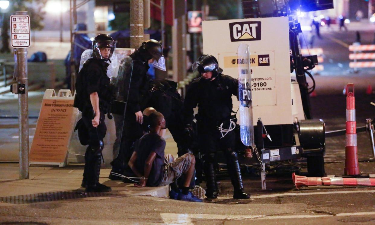 <span>Members of the St Louis police department detain Luther Hall in St Louis, Missouri, on 17 September 2017.</span><span>Photograph: Lawrence Bryant/Reuters</span>