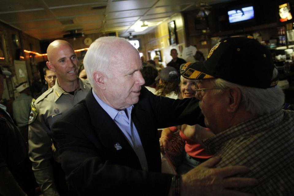 <p>McCain greets patrons at VFW Post #1677 during a campaign stop on April 24, 2010 in Casa Grande, Arizona. </p>