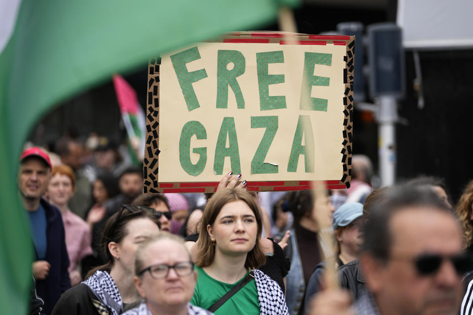 People carry posters and Palestinian flags during a Pro-Palestinian demonstration for excluding Israel from Eurovision ahead of the second semi-final at the Eurovision Song Contest in Malmo, Sweden, Thursday, May 9, 2024. (AP Photo/Martin Meissner)