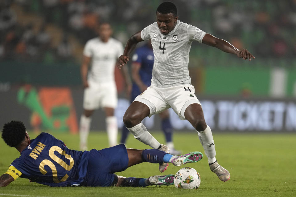 South Africa's Teboho Mokoena, right, is challenged by Cape Verde's Ryan Mendes during the African Cup of Nations quarter final soccer match between Cape Verde and South Africa, at the Charles Konan Banny stadium in Yamoussoukro, Ivory Coast, Saturday, Feb. 3, 2024. (AP Photo/Themba Hadebe)