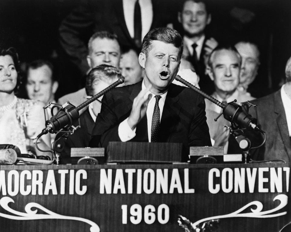 <p>Democratic presidential nominee Sen. John F. Kennedy thanks the Democratic National Convention for selecting him, on July 13, 1960, in Los Angeles. Kennedy won the nomination with a smashing first-ballot victory that pitted him against Vice President Richard M. Nixon. (Photo: Bettmann Archive/Getty Images) </p>