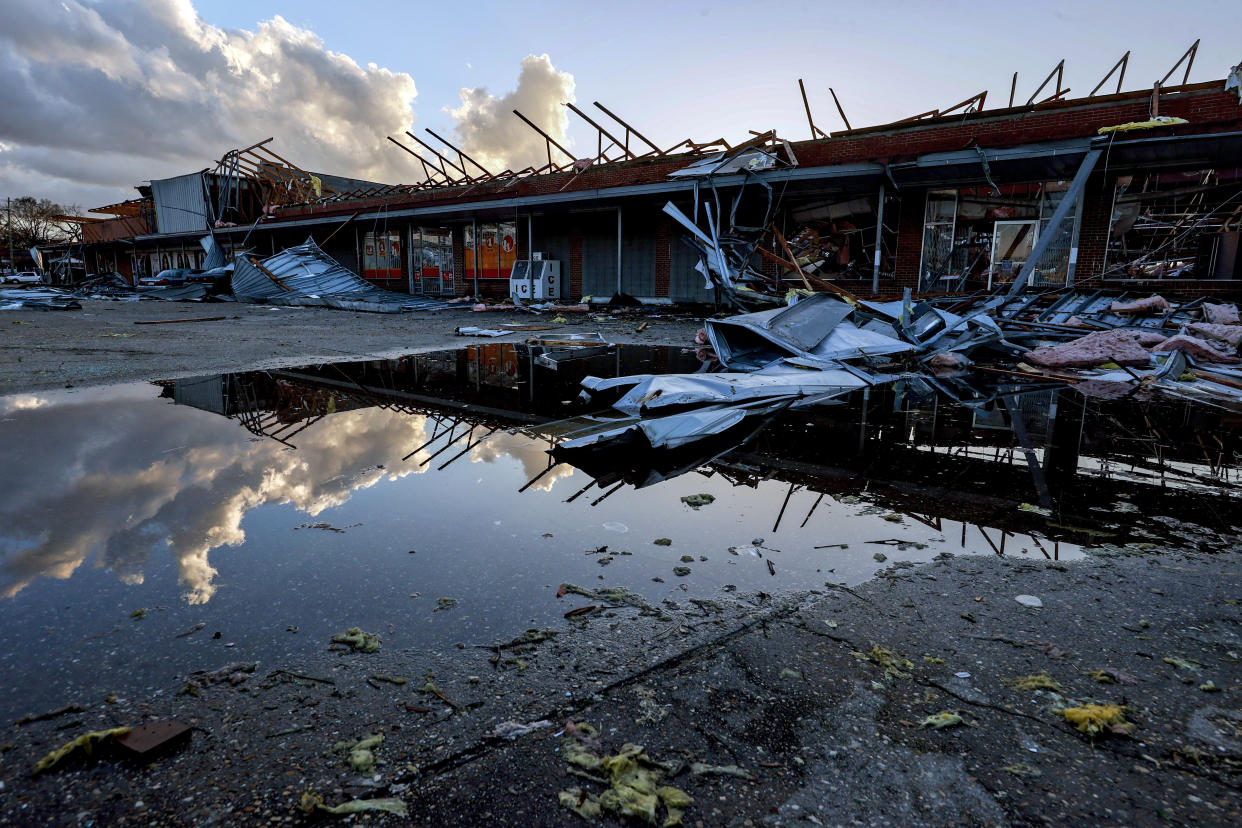 The roof of a local businesses is strewn about 