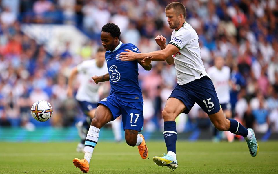 Raheem Sterling of Chelsea is challenged by Eric Dier of Tottenham Hotspur - Getty