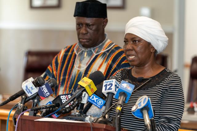 Eunice's Dwumfour's mother, Mary Dwumfour, speaks to the media during a press conference in Sayreville on Wednesday. Her husband, Prince Dwumfour, stands in the background.
