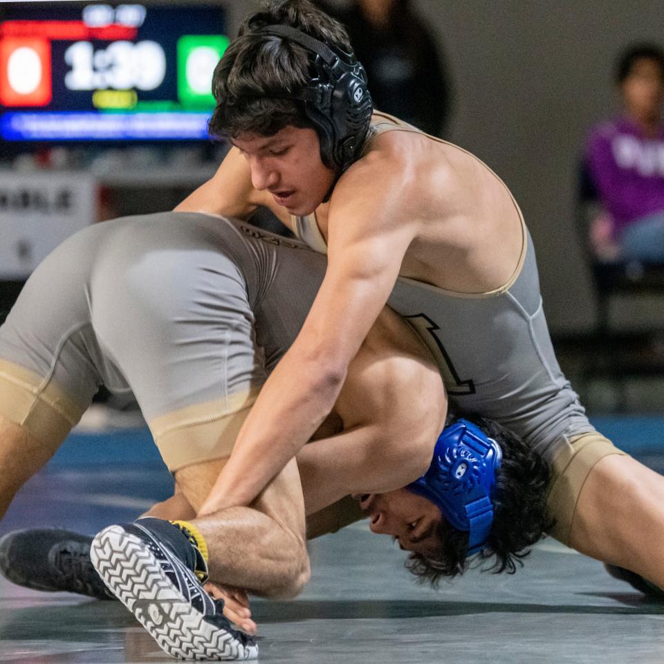 Hesperia teammates Hector Hernandez and Angel Salgado battled for the 120-pound championship at the 15th annual Adrian Amaral Scholarship Invitational on Saturday, Jan. 7, 2023.