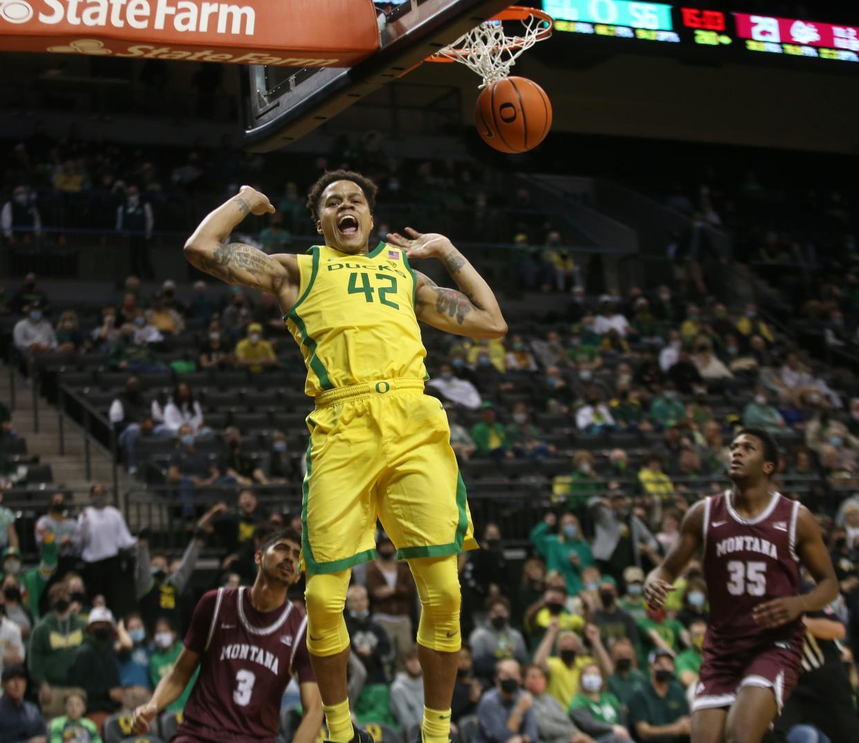 Oregon's Jacob Young dunks the ball against Montana during the second half Monday.