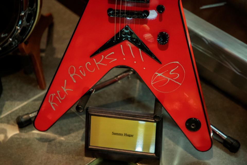 A guitar signed by Sammy Hagar is on display inside the 58,000-square-foot Heritage Center in Concord, North Carolina, on July 25, 2023.