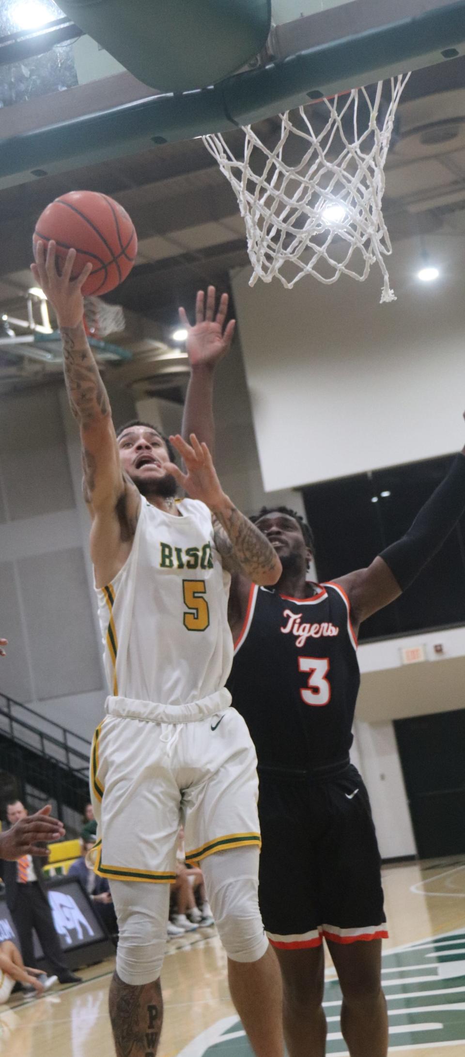 Oklahoma Baptist's Burke Putnam goes in for two points earlier this season.