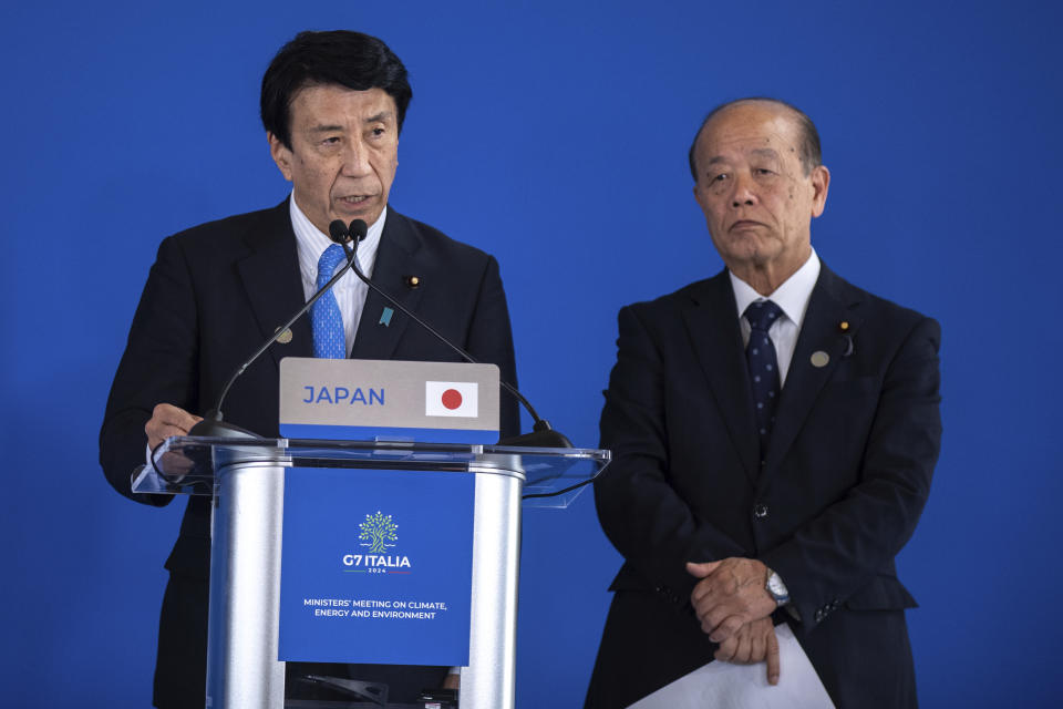 Japan's Minister of Economy Ken Saito, left, and Japan's State Minister of the Environment Tetsuya Yagi take part in the G7 Climate, energy and environment press conference at Venaria Reale in Turin, Italy, Tuesday April 30, 2024. (Alberto Gandolfo/LaPresse via AP)
