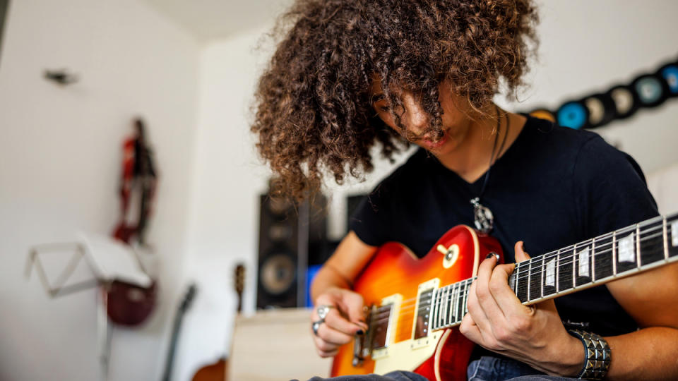 Young man playing guitar