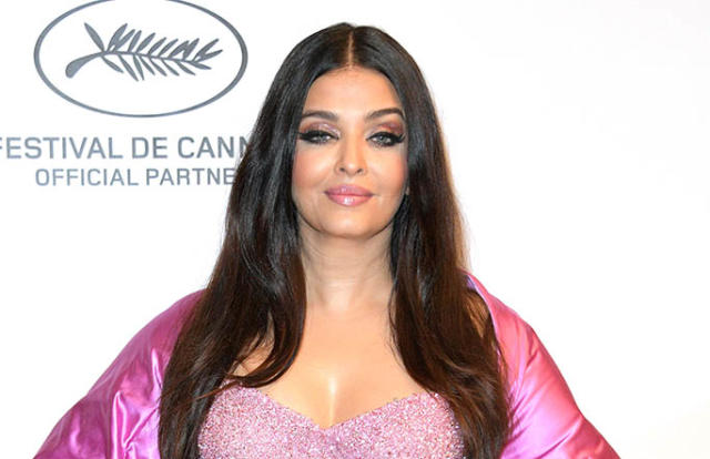 Aishwarya Rai Sparkles in Pink Waterfall Sequins Dress & Sandals at Cannes  L'Oréal Paris Anniversary Dinner