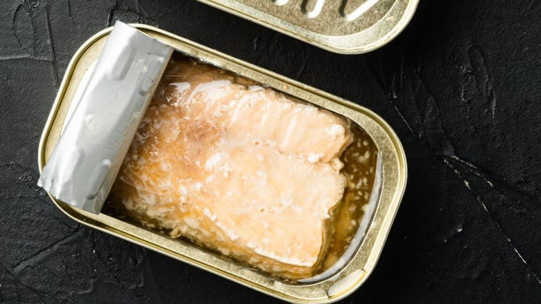 open tin of canned trout