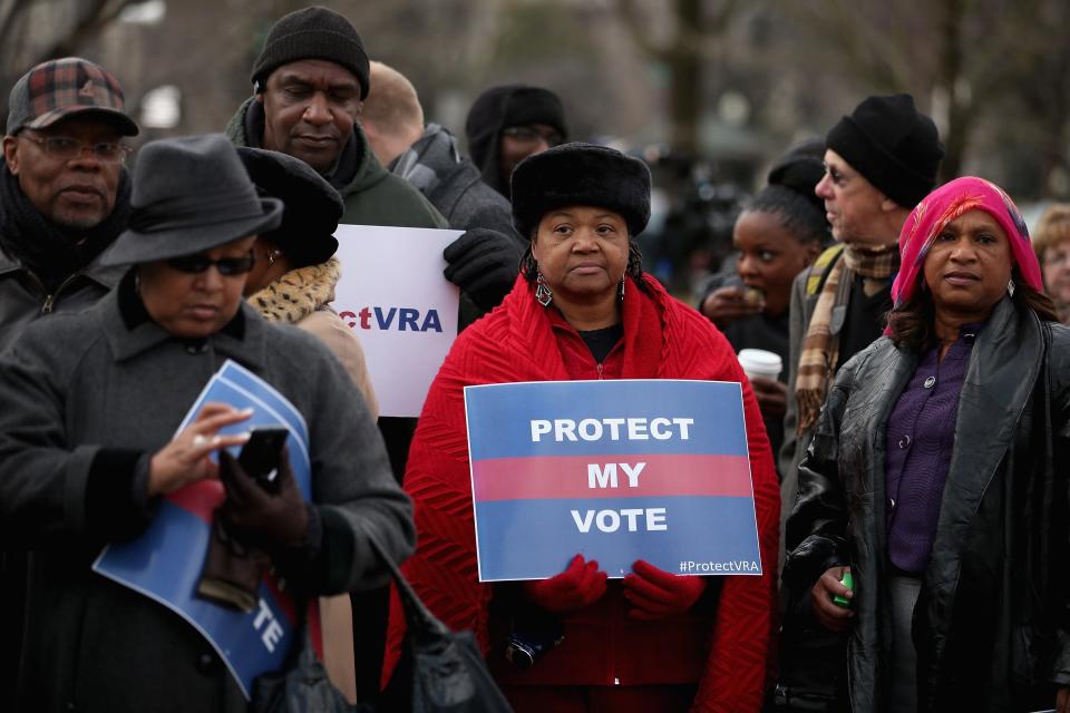 Alabama residents stand in line outside the U.S. Supreme Court to attend oral arguments as the high court considered Shelby County v. Holder on Feb. 27, 2013.