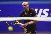 Rafael Nadal, of Spain, returns a shot to Rinky Hijikata, of Australia, during the first round of the US Open tennis championships, Tuesday, Aug. 30, 2022, in New York. (AP Photo/Charles Krupa)