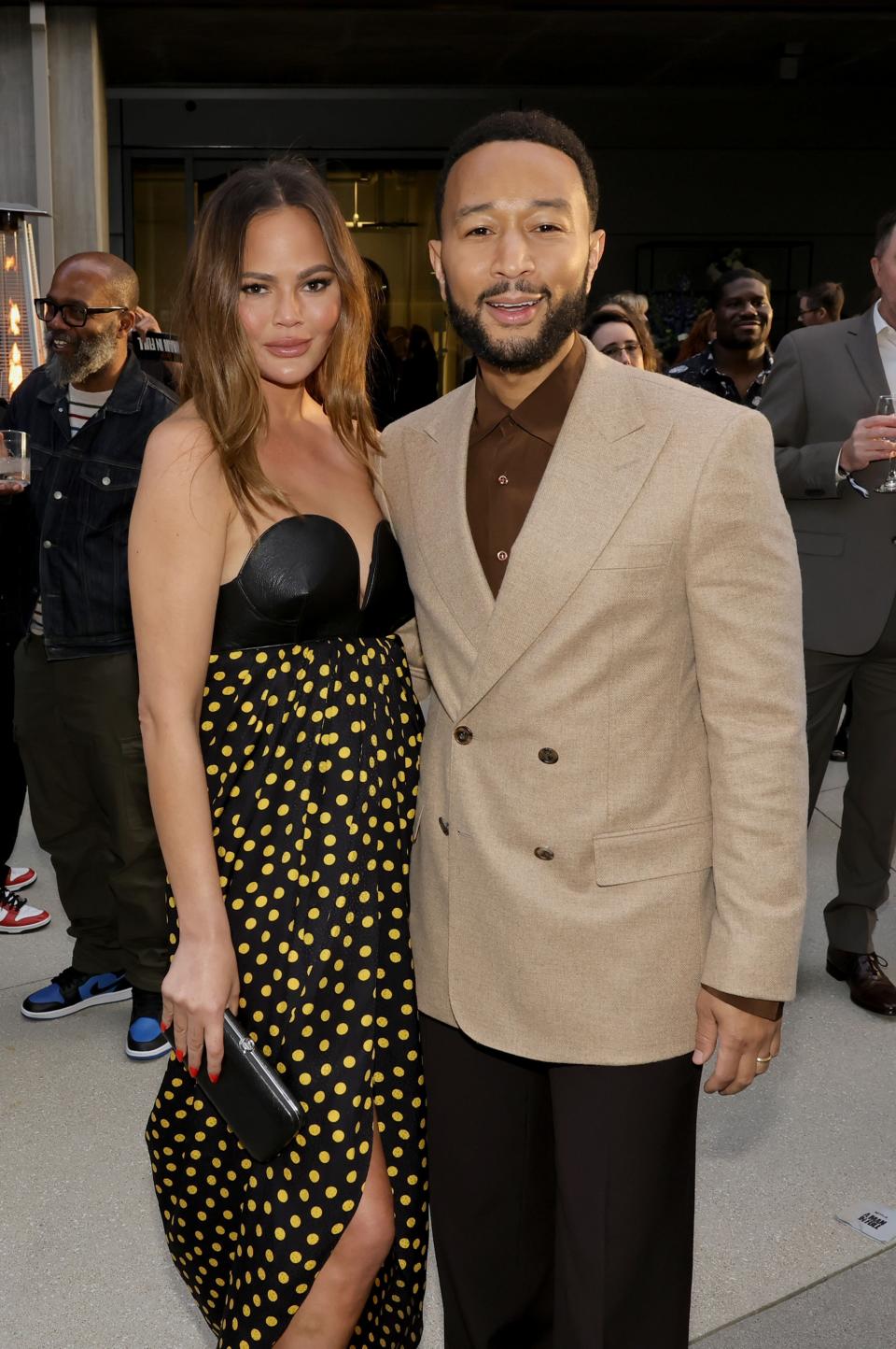 HOLLYWOOD, CALIFORNIA - APRIL 24: (L-R) Chrissy Teigen and John Legend attend the Los Angeles special screening of Netflix's "A Man In Full" at TUDUM Theater on April 24, 2024 in Hollywood, California. (Photo by Kevin Winter/GA/Penske Media via Getty Images)