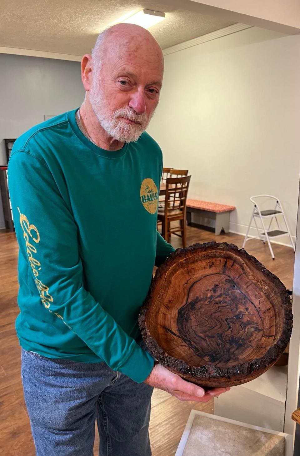 Marty Chapman, resident artist at Market Street Art Spot in downtown Minerva, displays his woodturning art at the relocated and expanded gallery.