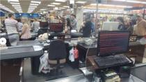 Customers queue in ÔRostÓ supermarket in Kharkiv, Ukraine June 27, 2017 in this picture obtained from social media. MIKHAIL GOLUB via REUTERS