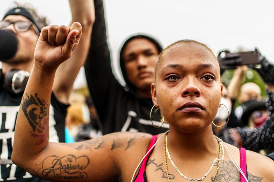 <div class="inline-image__caption"><p>A demonstrator cried during a protest against President Donald Trump’s visit to Kenosha, Wisconsin, on September 01, 2020. Days before the president's visit, heavily armed pro-Trump teen Kyle Rittenhouse shot and killed three people during protests against the earlier police shooting of an unarmed Black man, Jacob Blake. Trump defended the shooter, prompting a massive backlash.</p></div> <div class="inline-image__credit">Kerem Yucel/Getty</div>