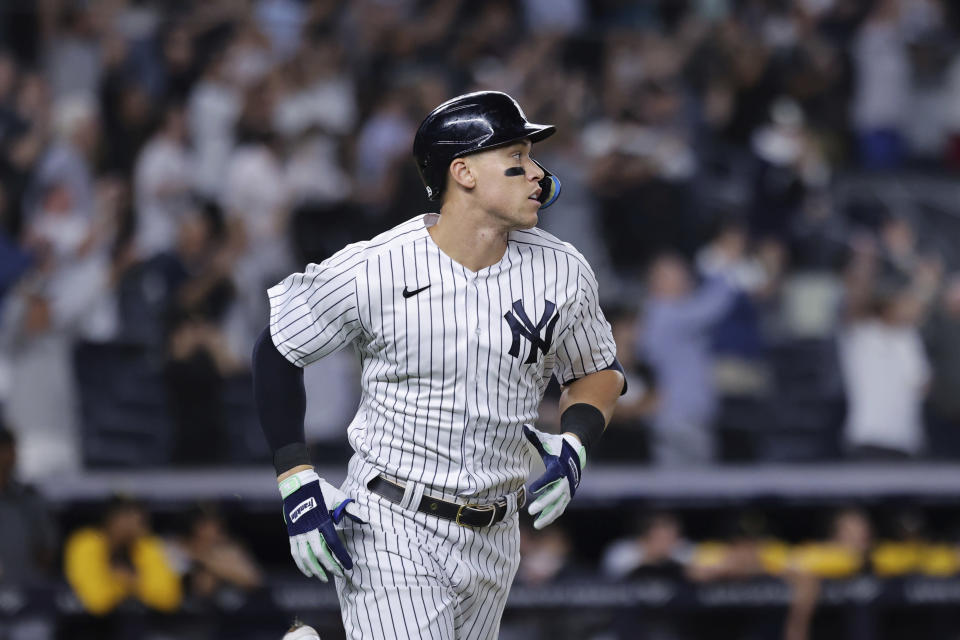 New York Yankees' Aaron Judge watches his 60th home run of the season, during the ninth inning of the team's baseball game against the Pittsburgh Pirates on Tuesday, Sept. 20, 2022, in New York. (AP Photo/Jessie Alcheh)