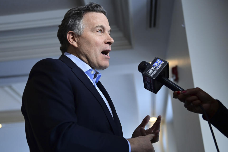 David McCormick, a Republican candidate for U.S. Senate in Pennsylvania, speaks while giving a interview during a campaign stop in Erie, Pa. on Saturday, Feb. 17, 2024. (AP Photo/David Dermer)