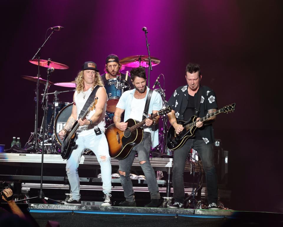 Country music band Parmalee with brothers Matt Thomas on lead vocals and guitar, Scott Thomas on drums, their cousin Barry Knox on bass and Josh McSwain on guitar play before the Tyler Hubbard show at the Iowa State Fair on East Side Night, Aug. 11, 2023.