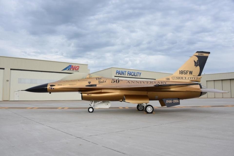 A gold US Air Force F-16A Falcon