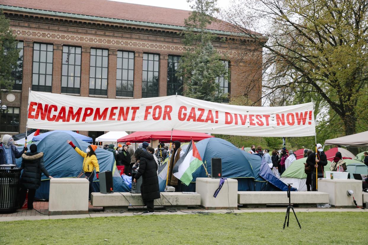 <span>University of Michigan students protest against Israeli attacks on Gaza as they set up an encampment on campus in Ann Arbor on Wednesday.</span><span>Photograph: Anadolu/Getty Images</span>