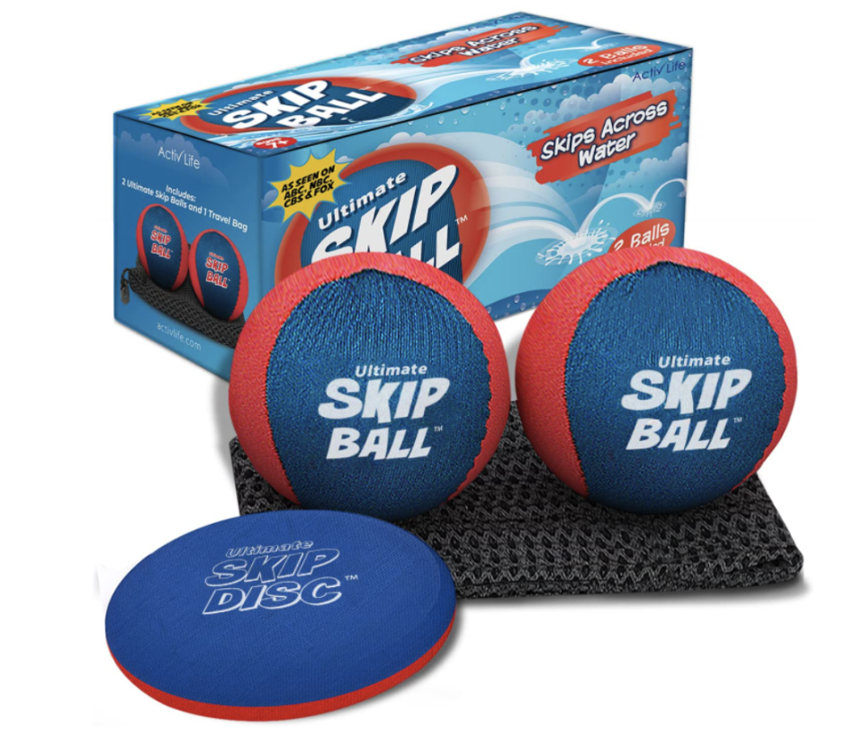 The Ultimate Skip Ball Set with blue and red balls and black pad, blue frisbee (Photo via Amazon)