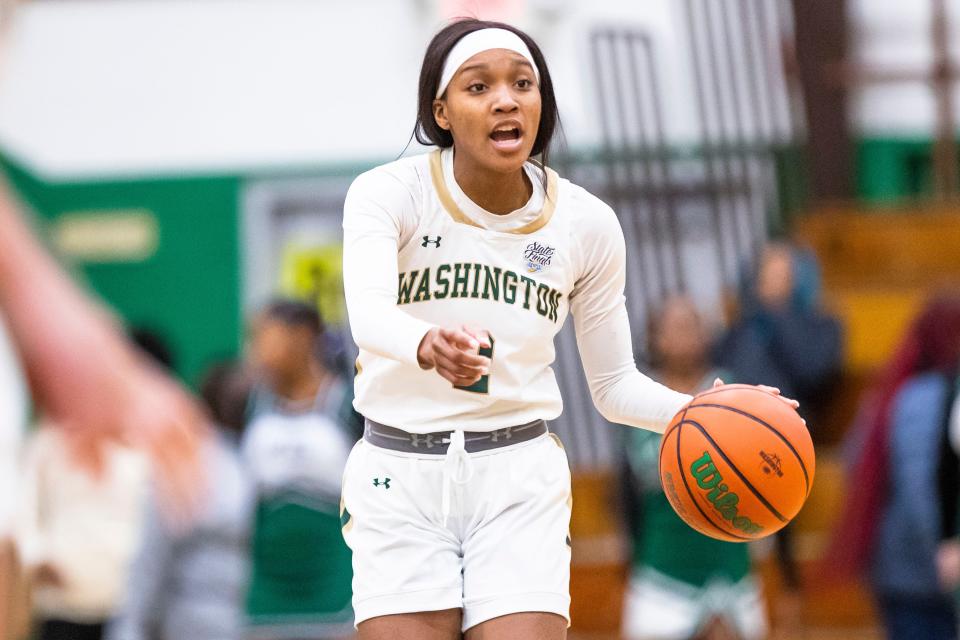 Washington's Rashunda Jones (2) calls a play during the Washington vs. Fort Wayne Northrop girls basketball game Wednesday, Jan. 18, 2023 at Washington High School.