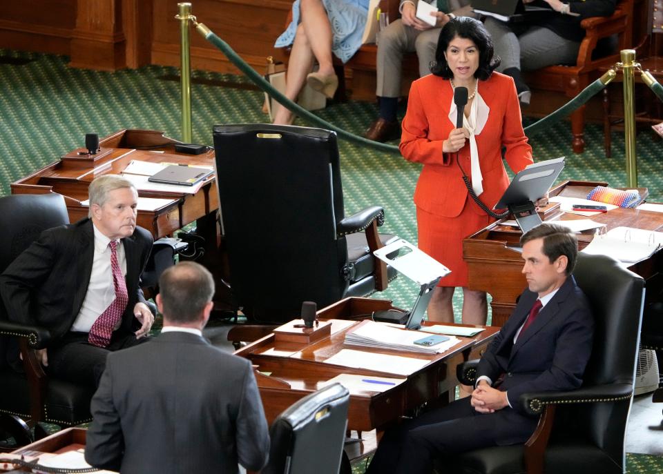 Sen. Carol Alvarado, D-Houston, debates Sen. Sen. Brandon Creighton, R-Conroe, on Oct. 12 about Senate Bill 1, which would establish an education savings account program. The Senate passed the bill, which appears unlikely to succeed in the House.