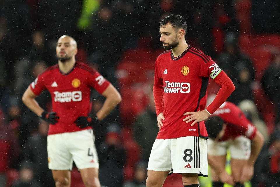 Manchester United captain Bruno Fernandes (right) reacts after losing to AFC Bournemouth at Old Trafford. 