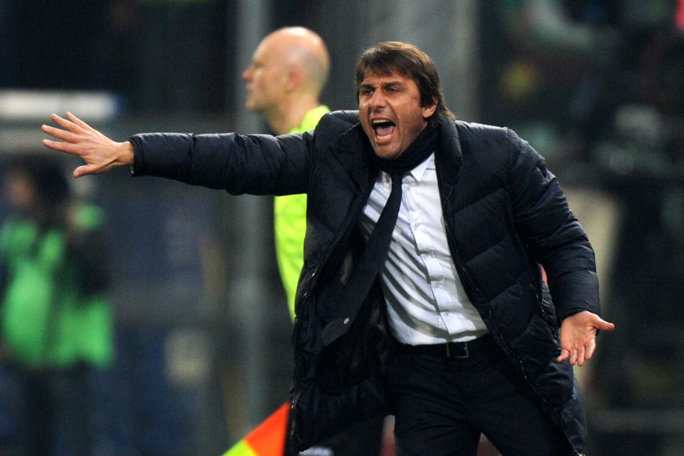 Juventus coach Antonio Conte shouts during a Serie A soccer match between Genoa and Juventus, at Genoa's Luigi Ferraris Stadium, Italy, Sunday, March 16, 2014. (AP Photo/Tano Pecoraro)