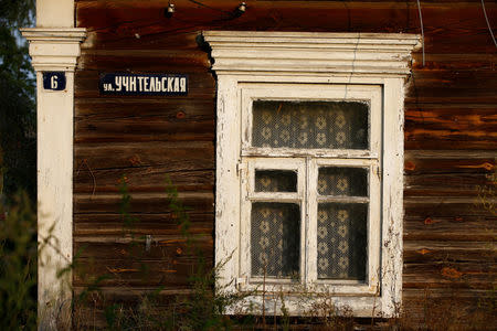 A street nameplate is seen on a wall of an old house in the village of Pogost, Belarus, August 16, 2017. REUTERS/Vasily Fedosenko